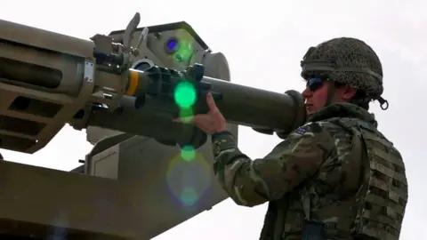 BBC visits Iraq base targeted up to 28 times daily amid Iran conflict tensions