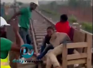 Video of Officials Beating Young Men Found on Railway Tracks Sparks Public Debate