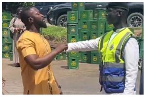 Viral Video Shows Police Officer and Bystander Clash at Accra Truck Accident Scene