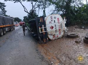 Diesel Tanker Overturns at Enyiresi After Rain-Slick Road Causes Serious Highway Crash