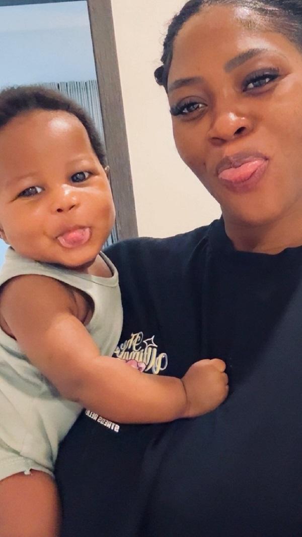 PHOTOS: Eazzy Shares Heartwarming Playful Moments With Son Alongside Medikal