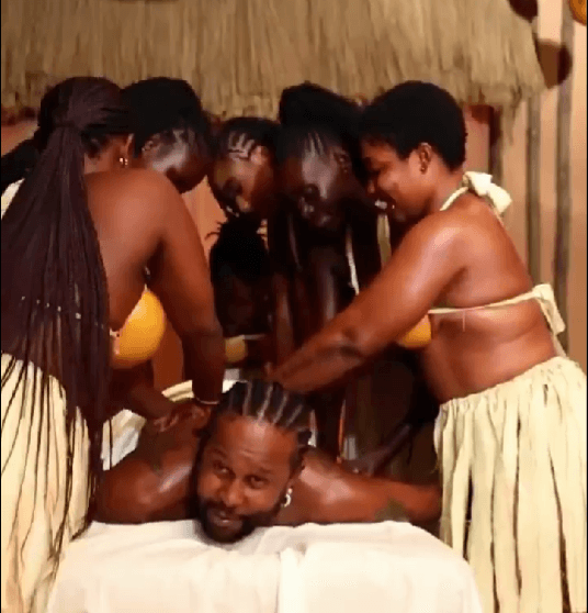 Popcaan Embraces Ghanaian Culture with Traditional “Kuriya Kuriya” Massage Experience